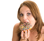 Woman eating cake